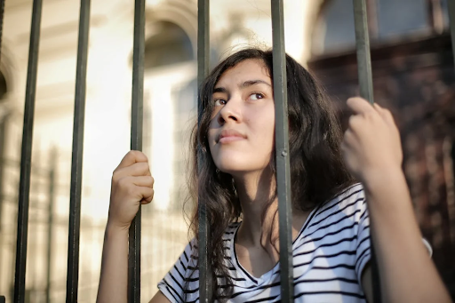 Woman behind bars